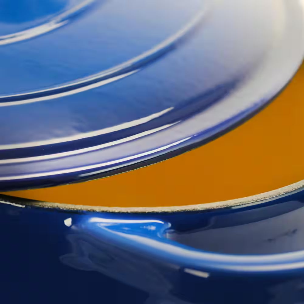 Artisan 7 Qt. Oval Cast Iron Nonstick Dutch Oven in Sapphire Blue with Lid